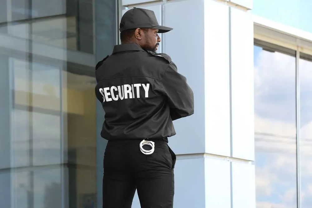Security Guard For Banks Monitoring Entrances